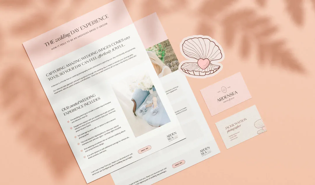 photo of branded documents and business cards for a wedding film and photography brand